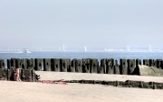 sails behind the jetty